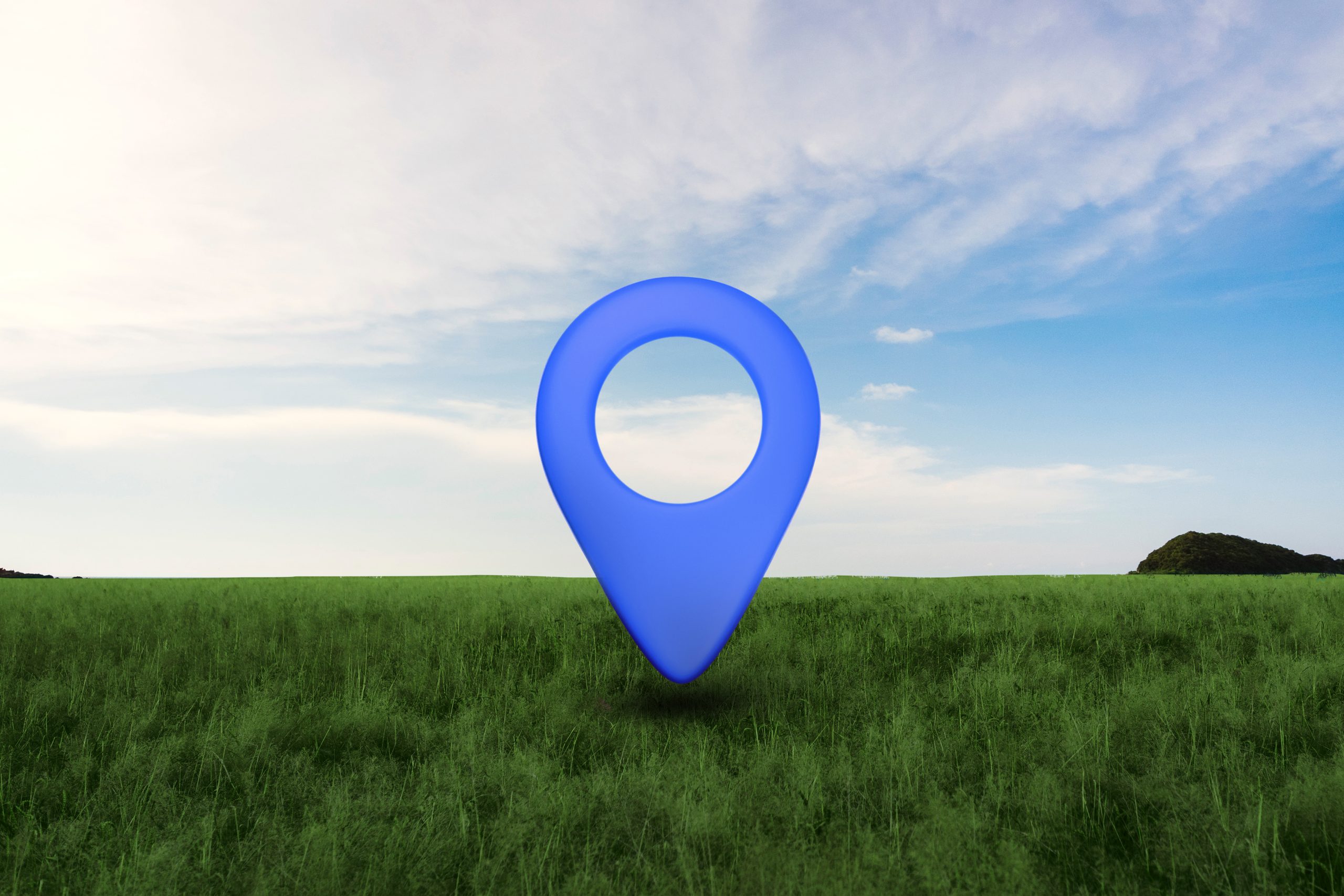 location-symbol-with-landscape-background